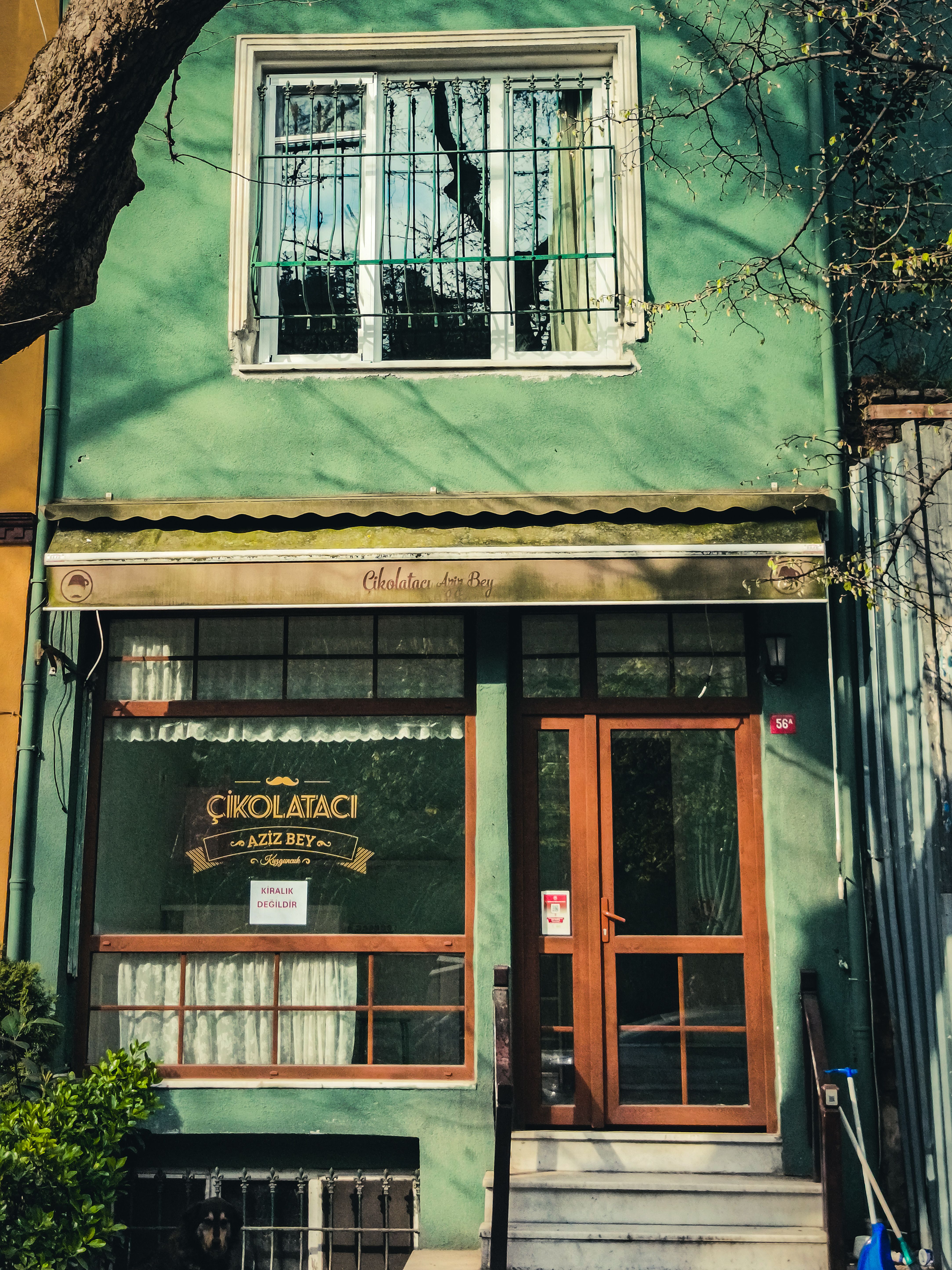 Front view of a colorful chocolate shop in Istanbul, Türkiye, capturing its vintage facade.