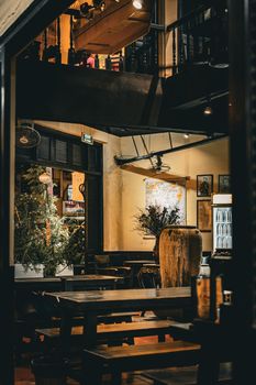 Warm and inviting interior of a café in Ho Chi Minh City, perfect for relaxation and gatherings.