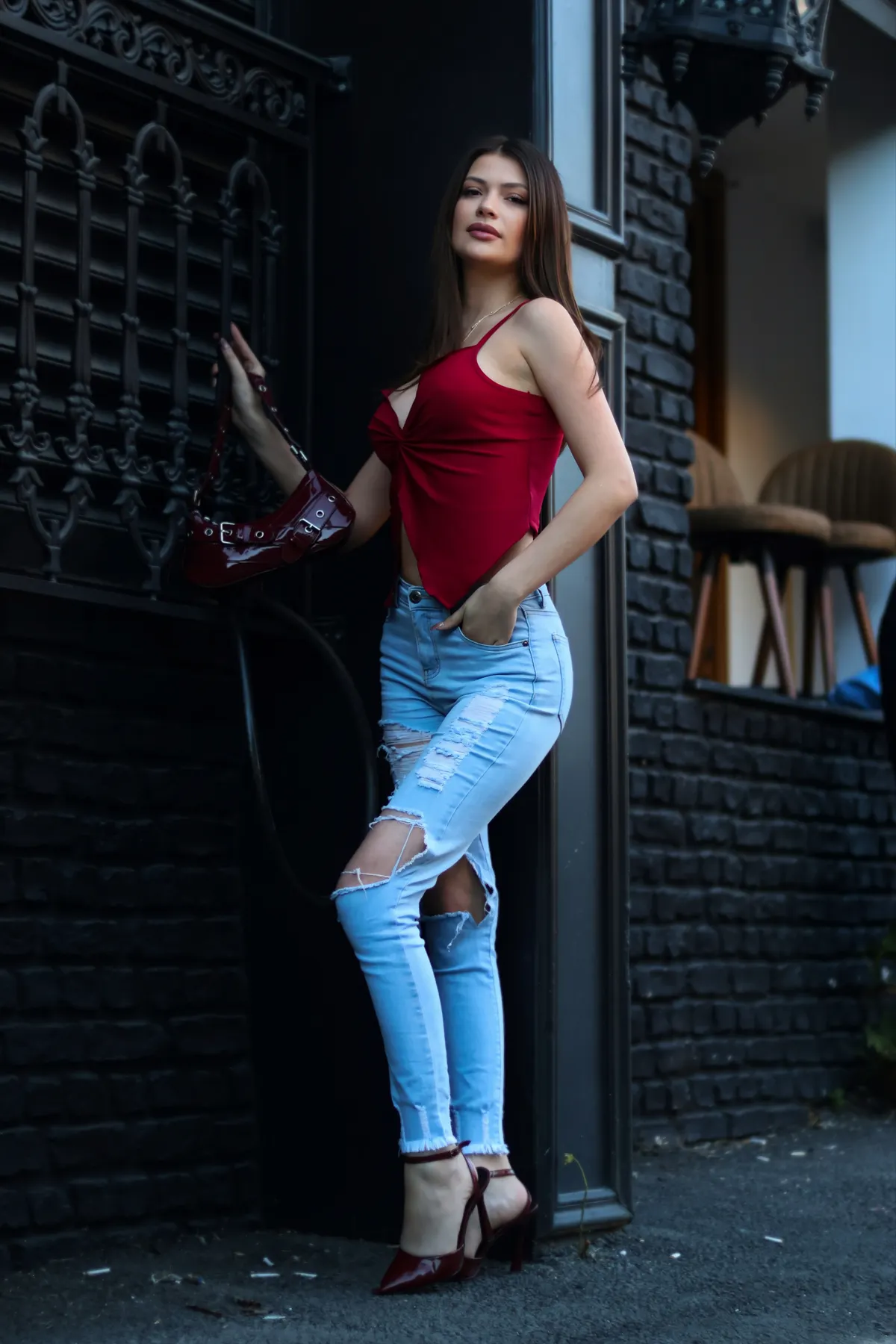 Woman in red top and jeans, summer day