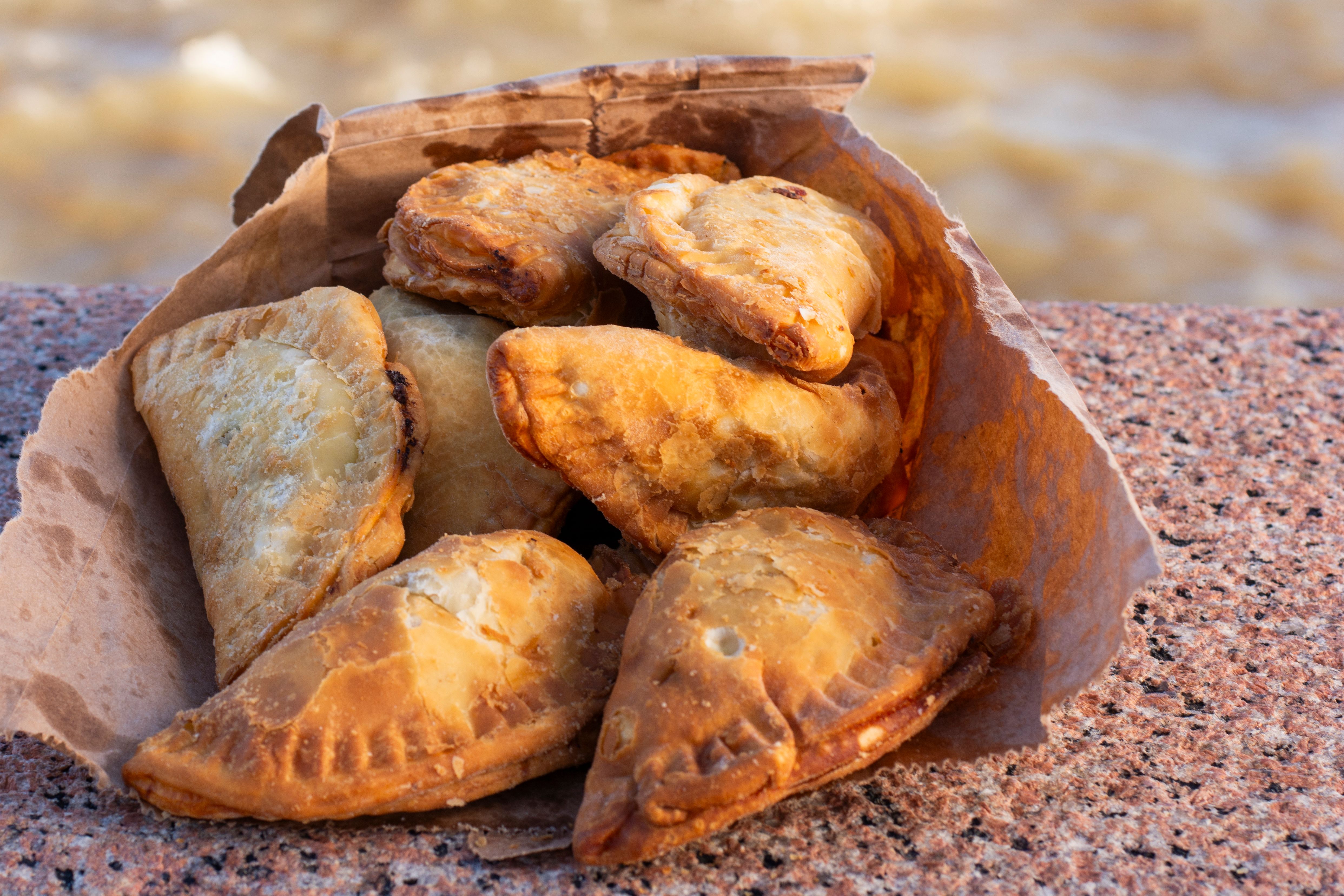 Belize City market with traditional Creole food vendors and fry jacks