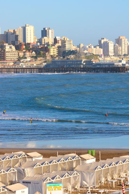 Free Beachfront view of Mar del Plata with city skyline and ocean waves, Argentina. Stock Photo