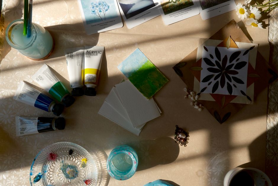 art supplies on table natural light lifestyle photo 1