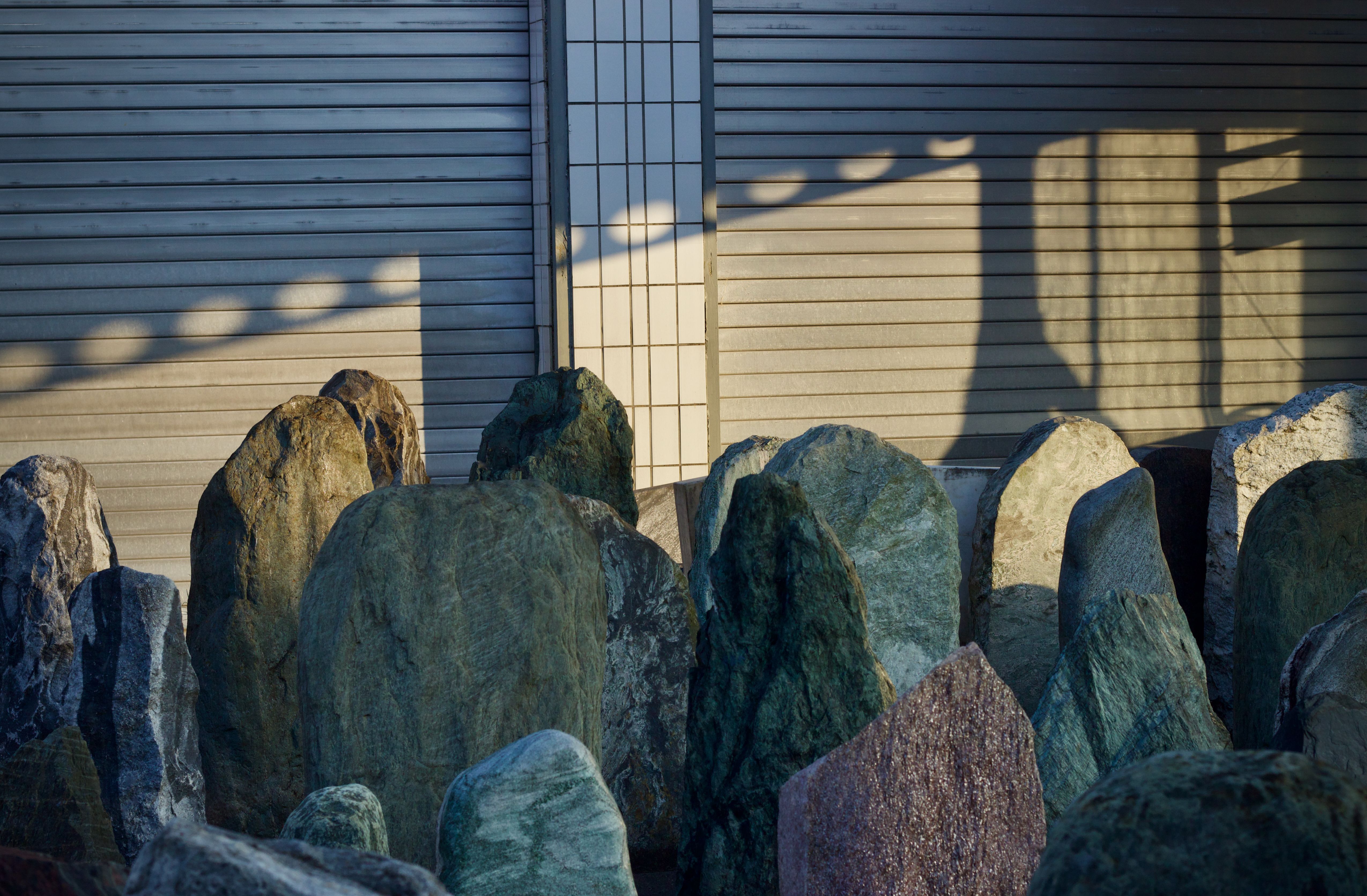 Natural Stone Arrangement in Sunlit Urban Setting · Free Stock Photo