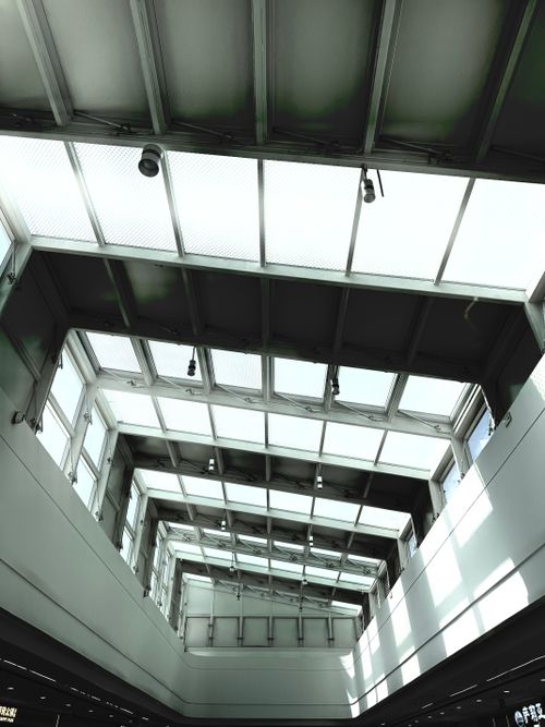 Free A modern skylight design in an indoor space with ample natural lighting and geometric patterns. Stock Photo