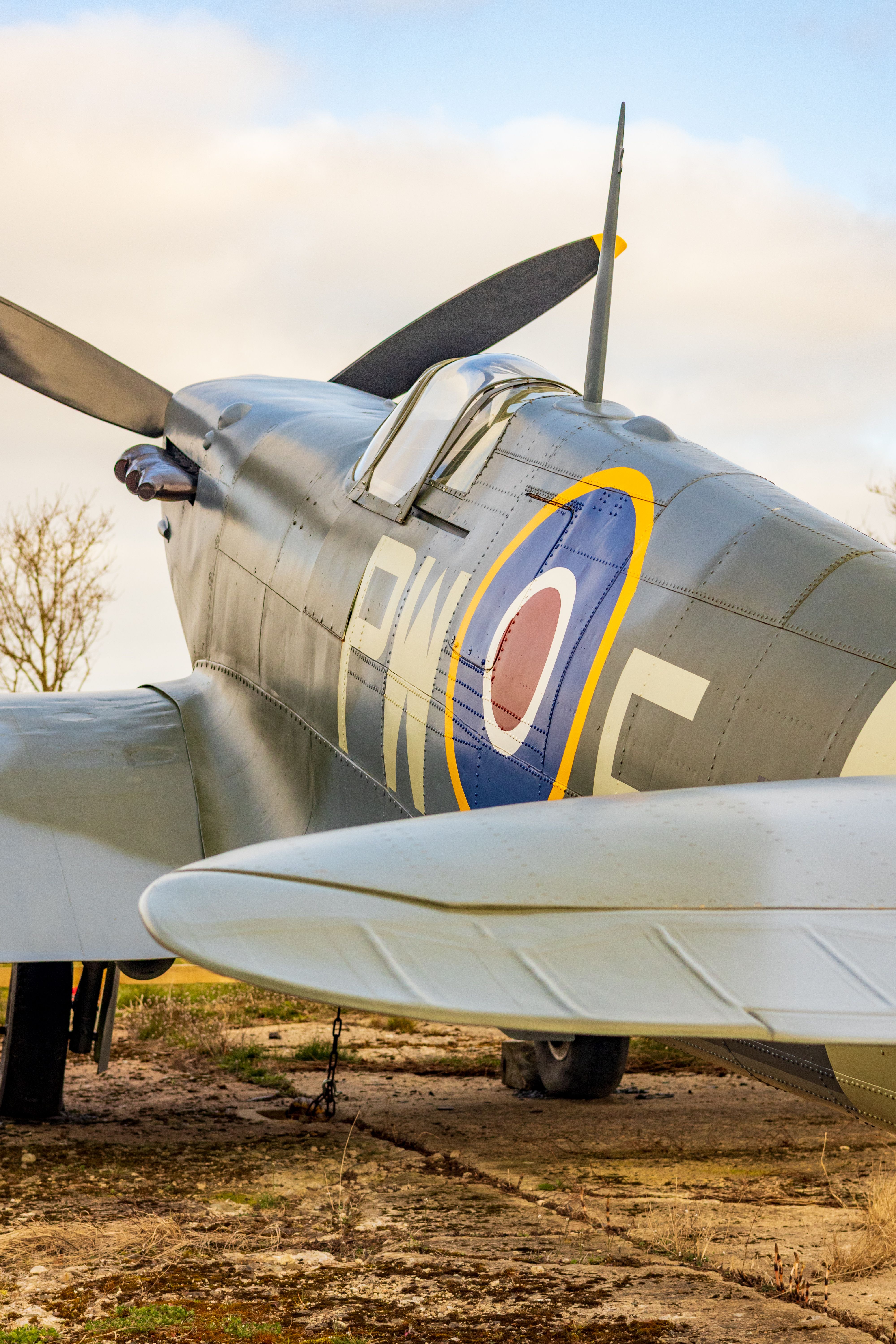 Supermarine Spitfire and Hawker Hurricane fighter aircraft on display in the Battle of Britain hangar at the RAF Museum London