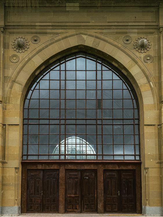 Grand Arched Window At Historic Building Free Stock Photo grand-arched-window-at-historic-building-free-stock-photo