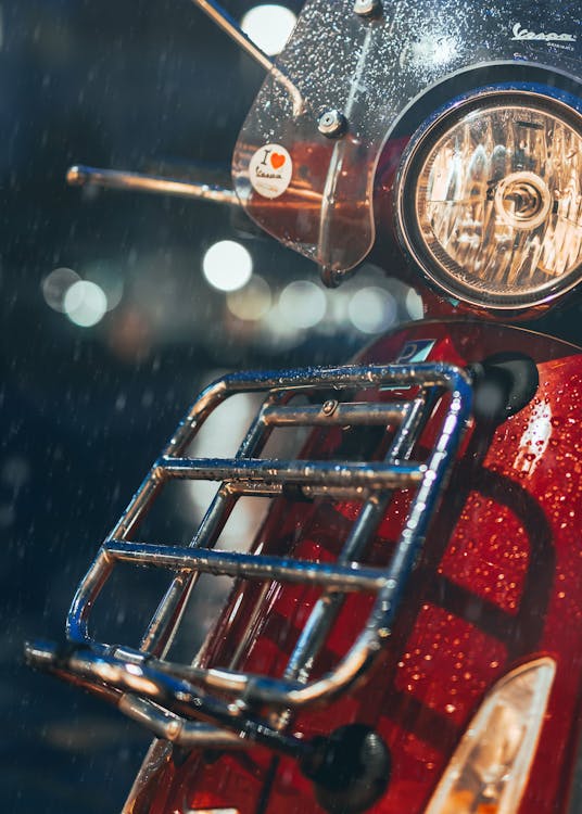 Free Red Motorcycle Park On Sidewalk At Rainy Night Stock Photo