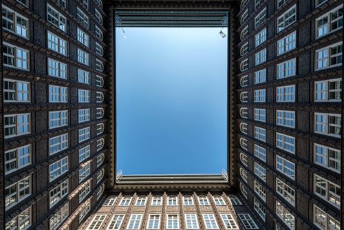 Free Symmetrical architectural view of Sprinkenhof in Hamburg, showcasing unique geometry and historic design. Stock Photo