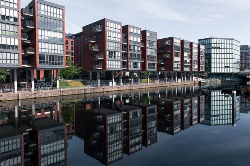 Free Reflective view of modern office buildings in Hamburg's Hafencity district. Stock Photo
