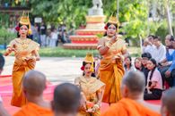 Traditional dancers perform a cultural ceremony in Battambang Province, Cambodia, showcasing vibrant costumes and heritage.