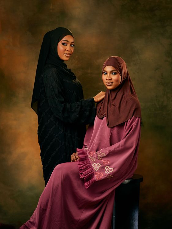 Elegant Portrait of Two Women in Traditional Dress · Free Stock Photo