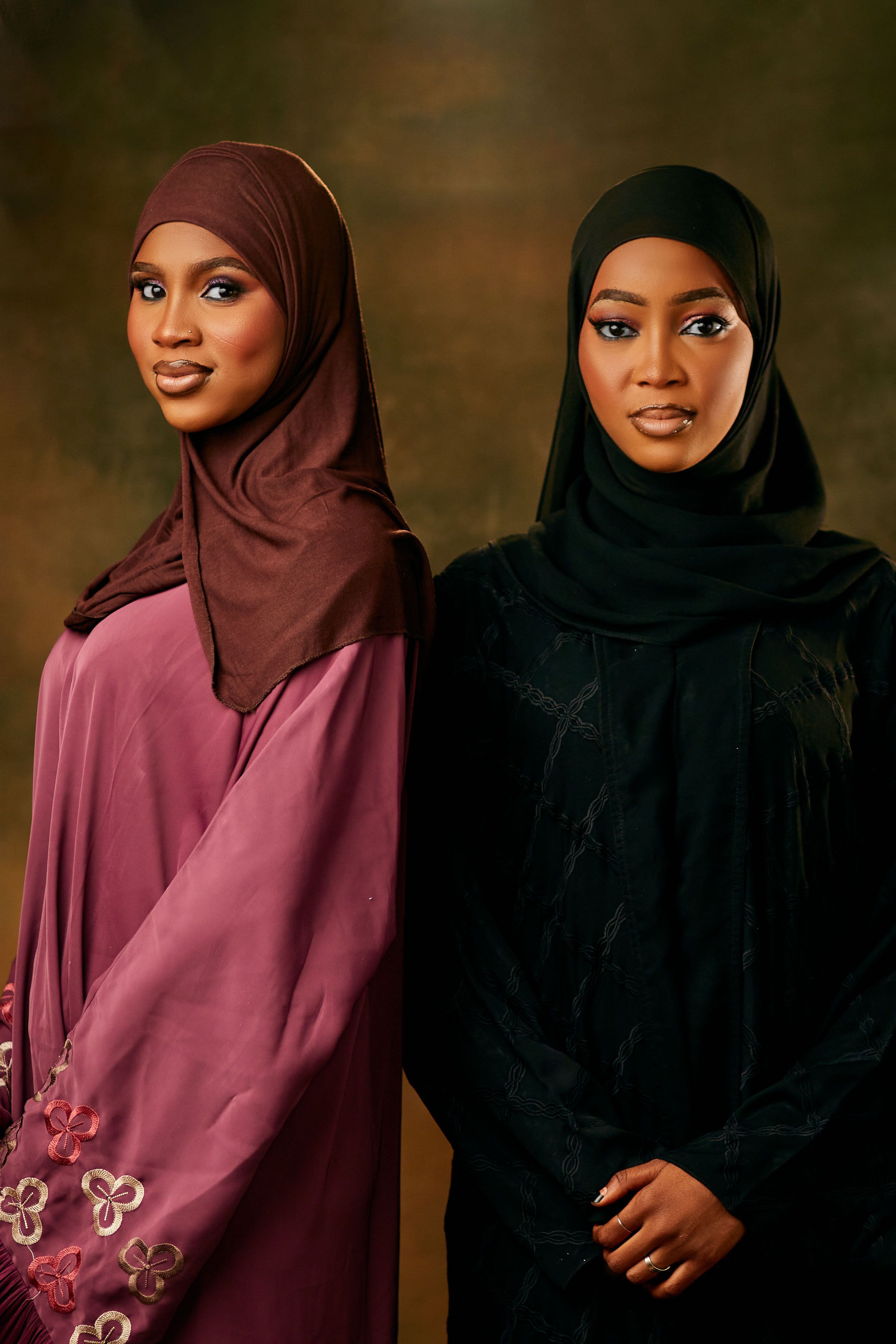 Elegant Portrait of Two Women in Traditional Attire · Free Stock Photo