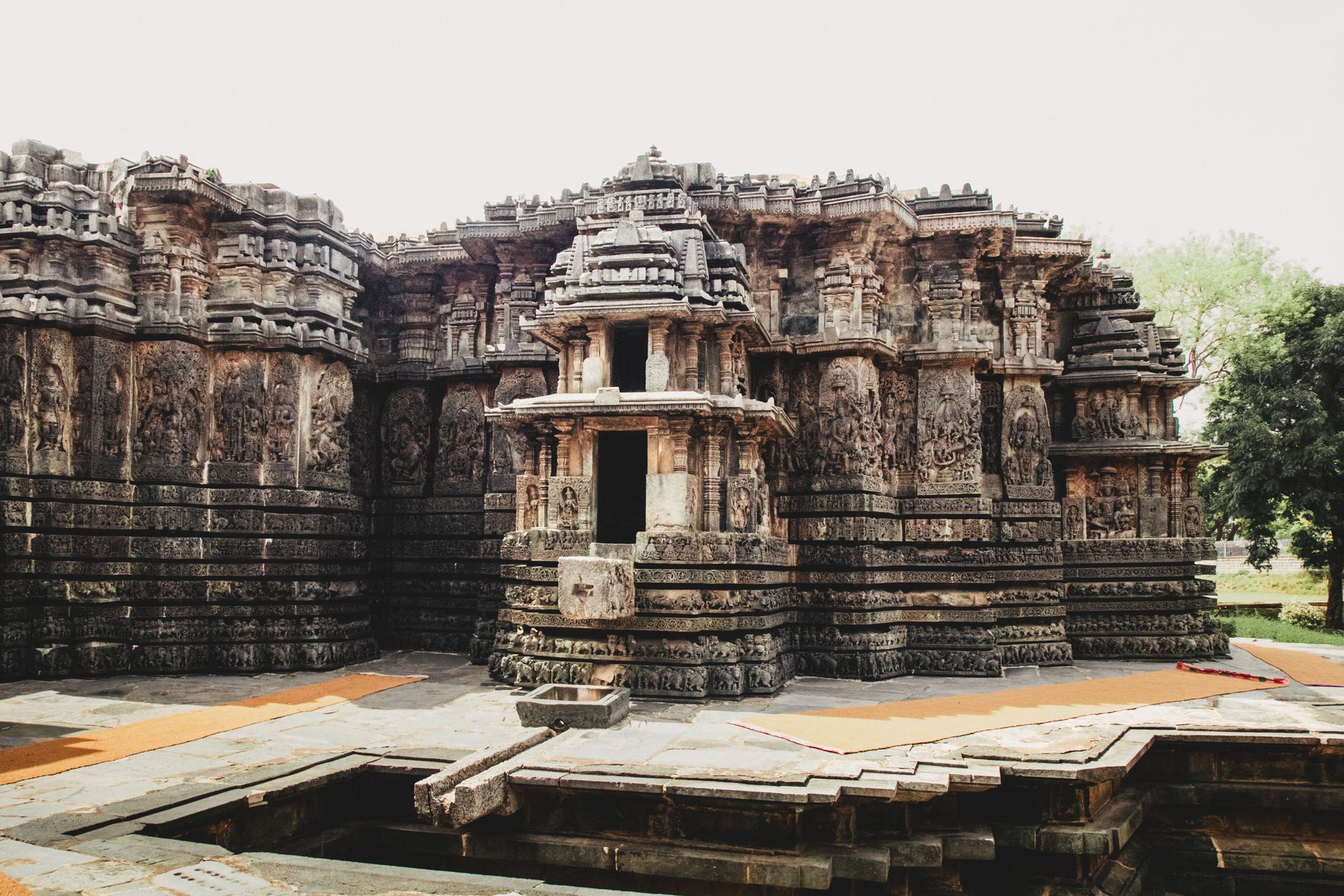 Ancient stone temple with intricate carvings and rich history, showcasing architectural brilliance.