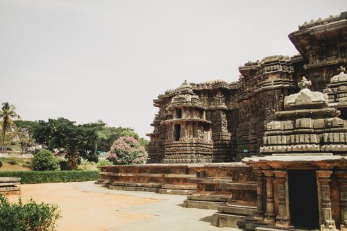 Free Detailed view of intricate stone carvings on an ancient temple facade, showcasing historical architecture. Stock Photo