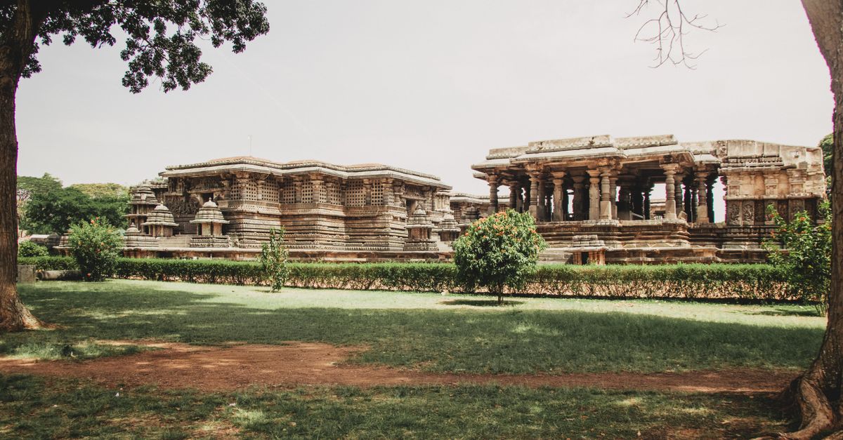 Temple Setting Intricate Ancient Temple in Lush Setting · Free Stock Photo