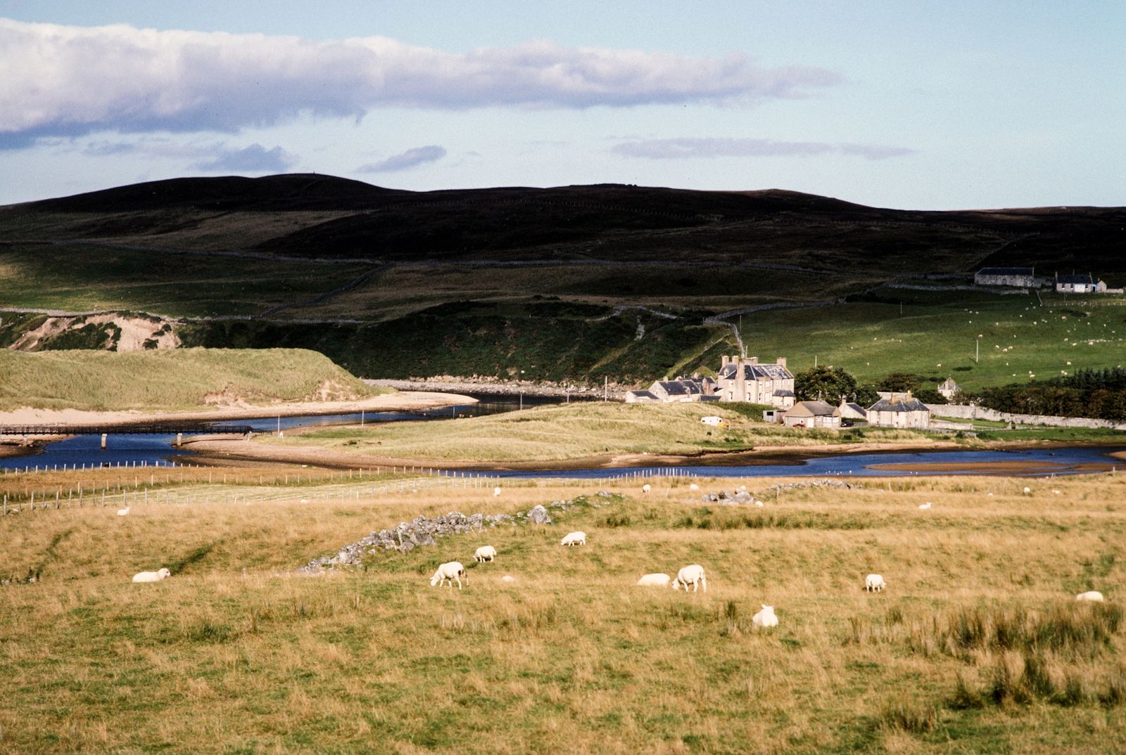 Traditional stone houses in the Scottish countryside, shown on our Solar Quotes Aberdeen cookie policy page