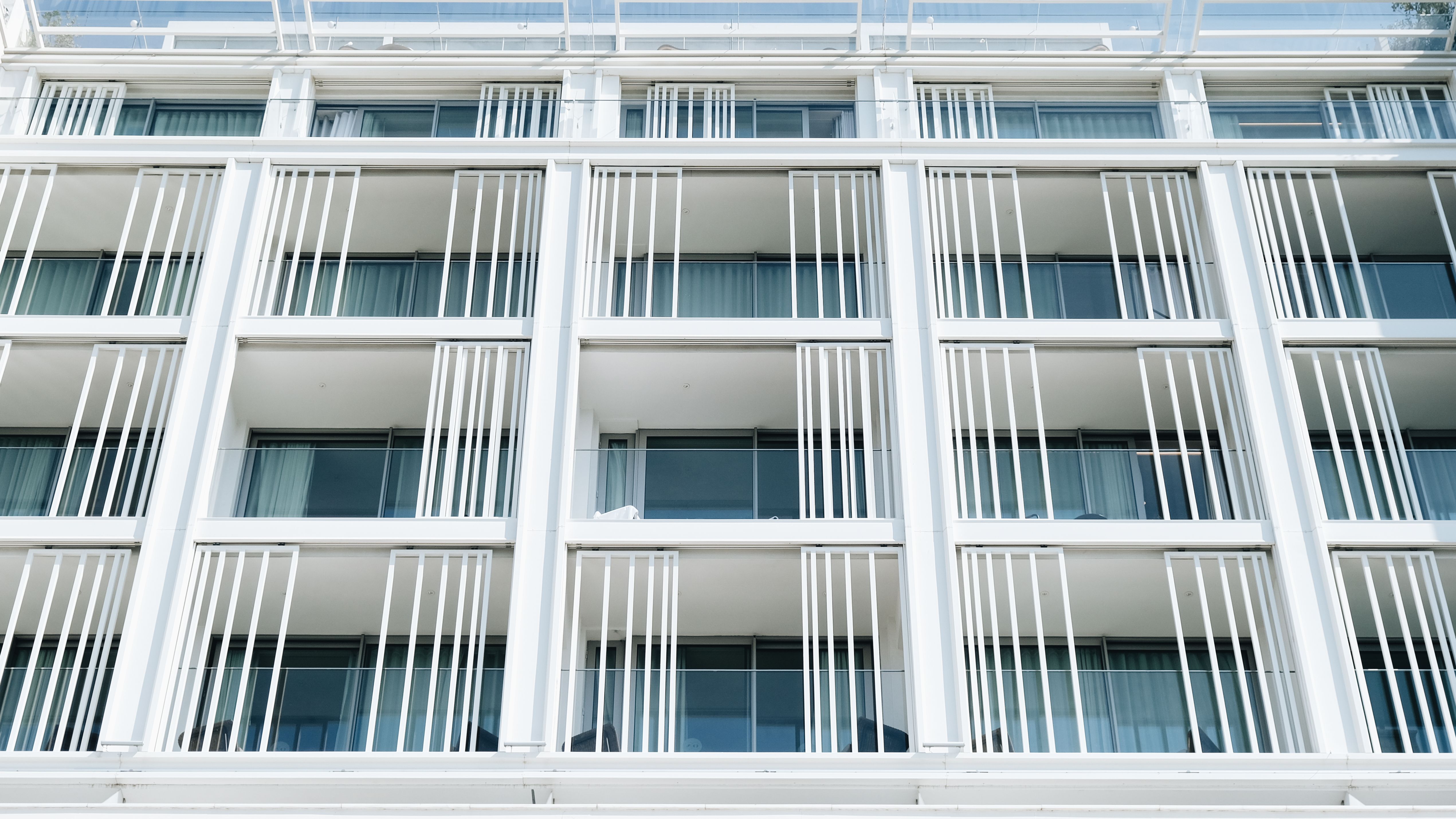 Modern White Apartment Building Exterior Facade · Free Stock Photo