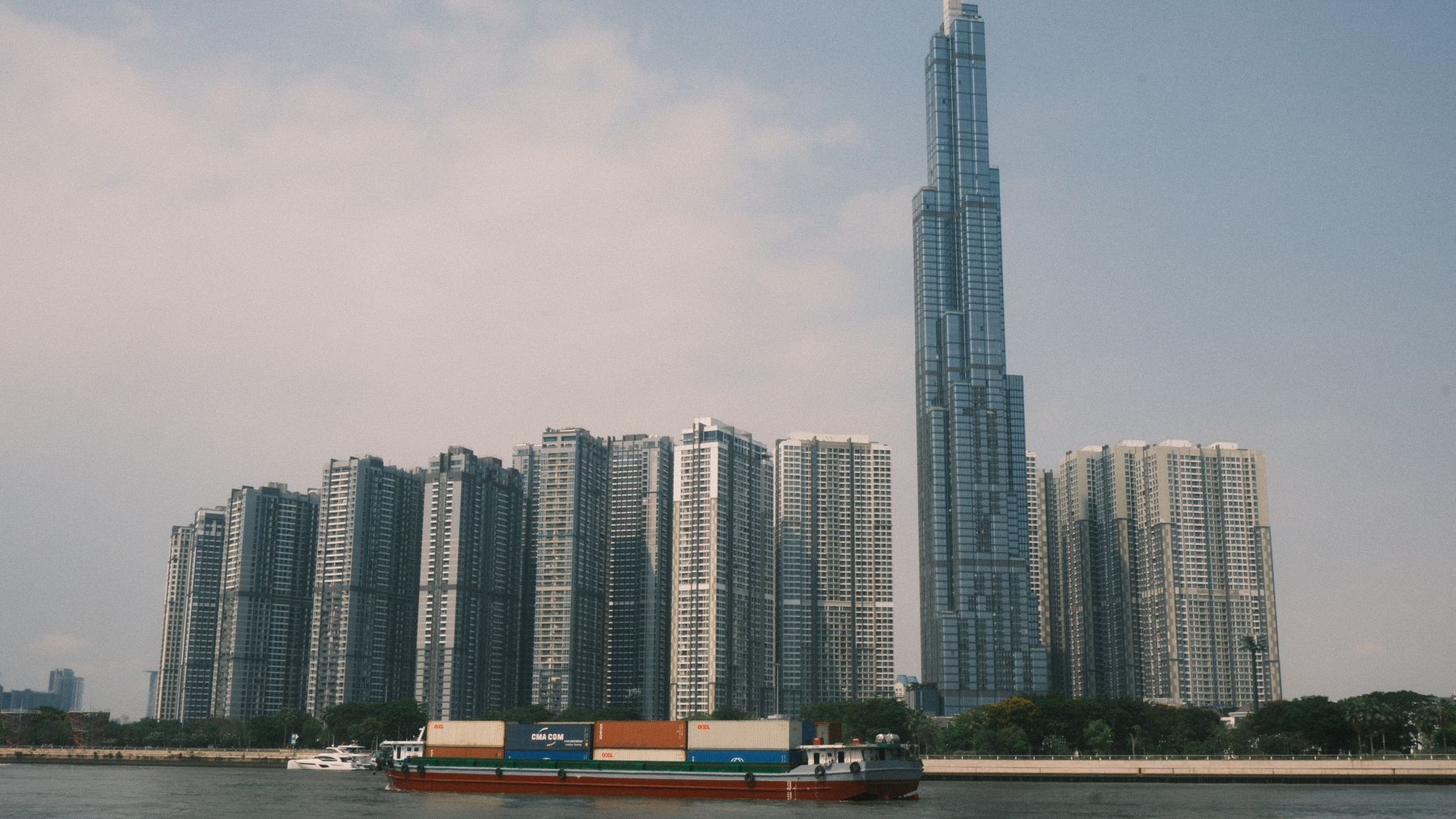 Skyline view of Landmark 81 with Saigon River in Ho Chi Minh City, Vietnam.