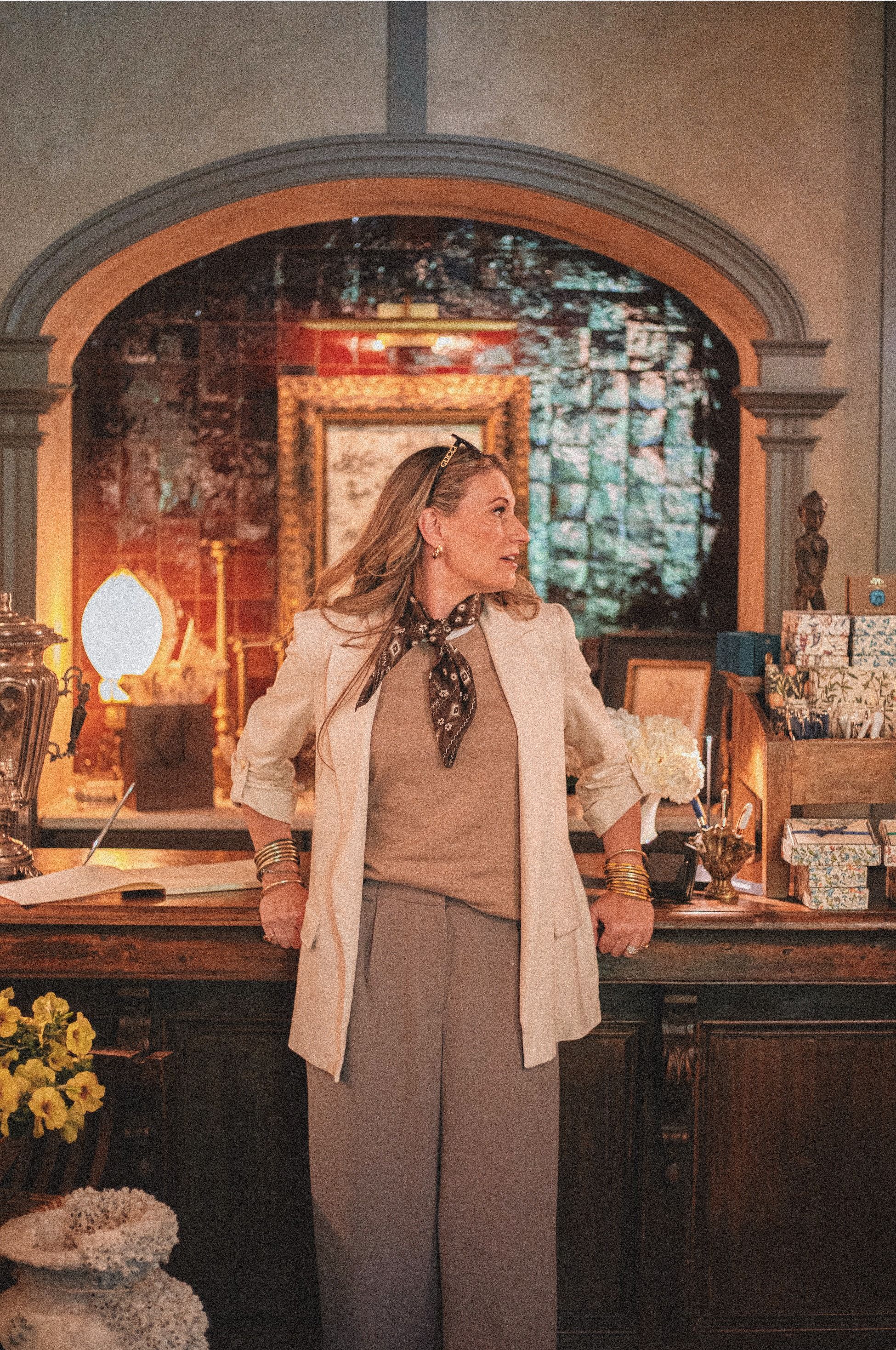 Elegant Woman in a Boutique Interior Setting · Free Stock Photo