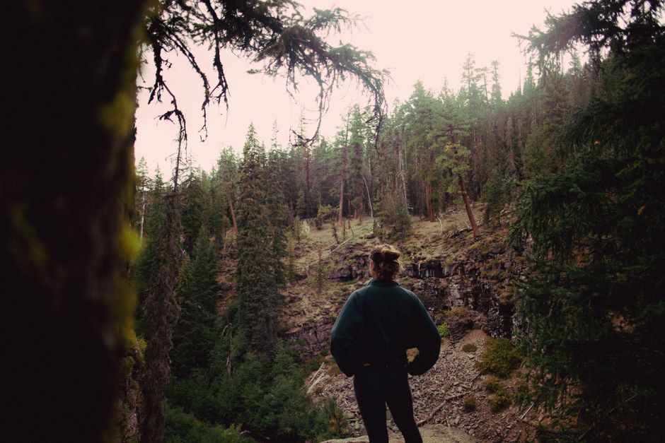 A female runner standing in front of a crossroad on a forest trail- The High-Functioning Burnout A female runner standing in front of a crossroad on a forest trail- The High-Functioning Burnout