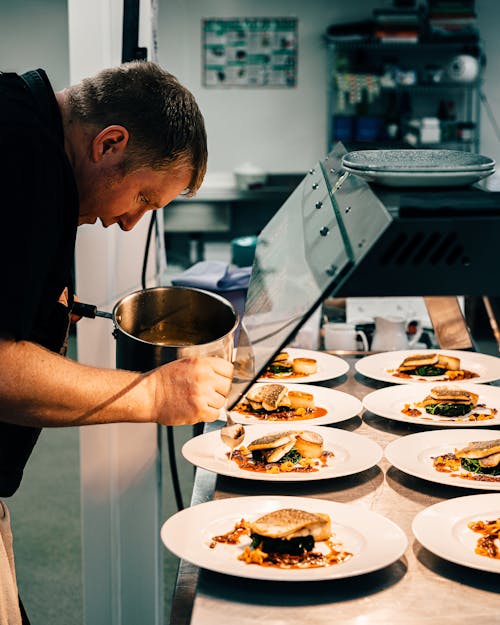 Chef Meticulously Preparing the Meal