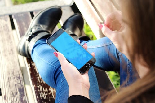 Woman Holding Space Gray Iphone 6