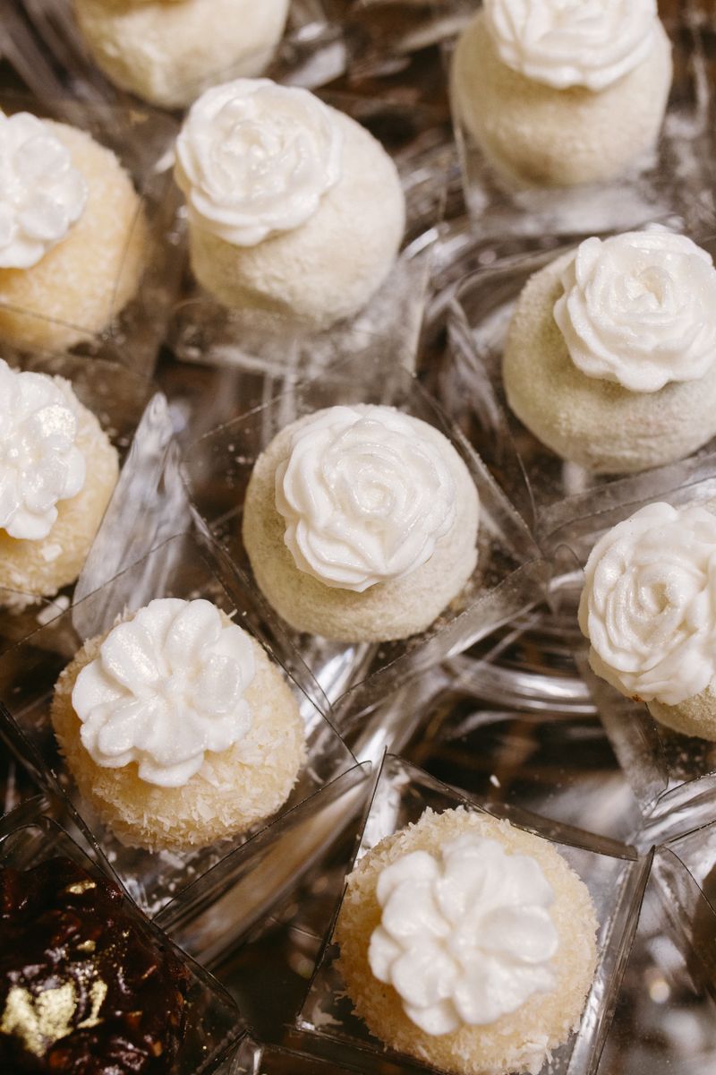 Elegant white chocolate truffles with rose petals