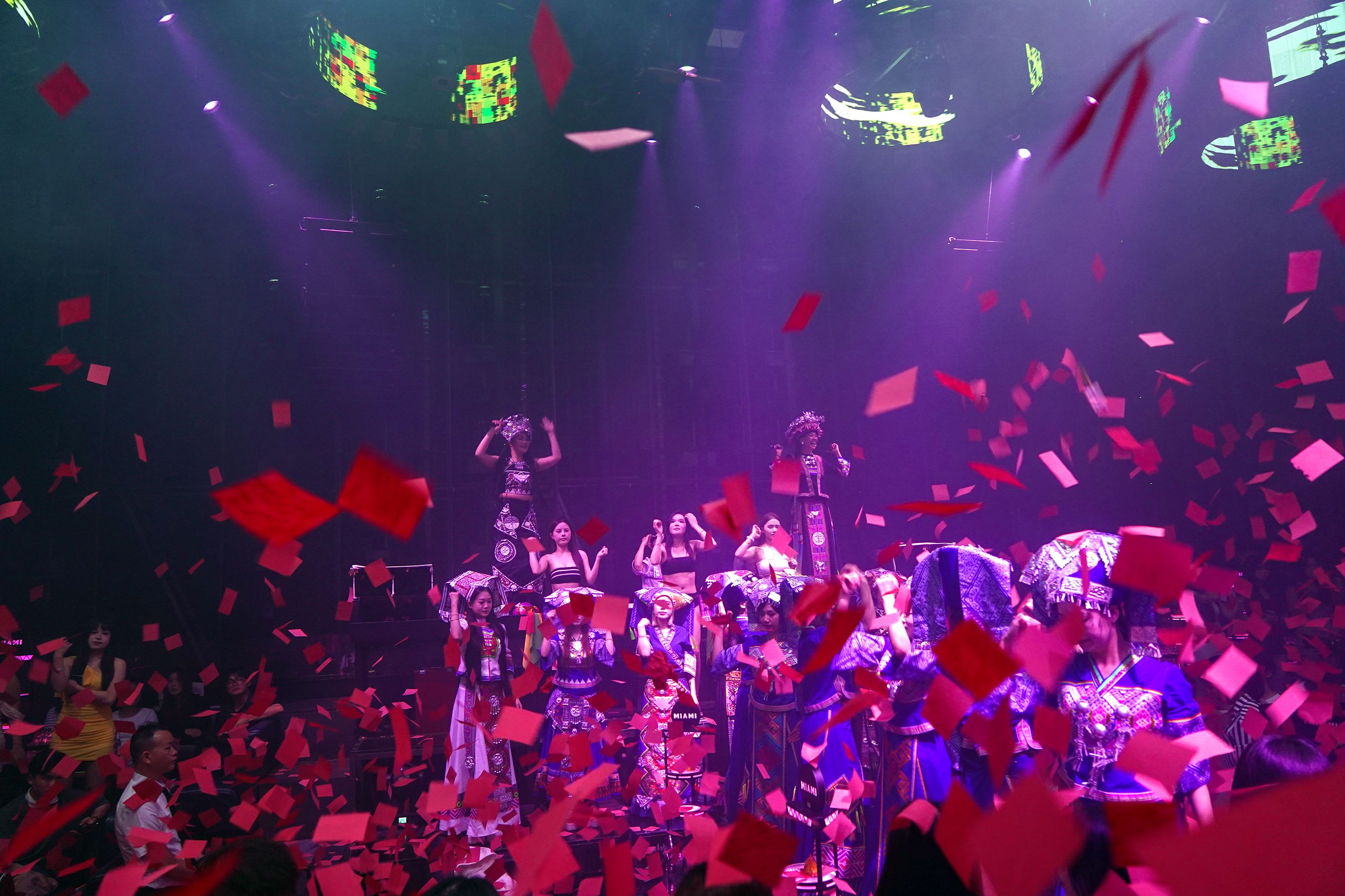 Vibrant Stage Performance with Confetti and Costumes · Free Stock Photo
