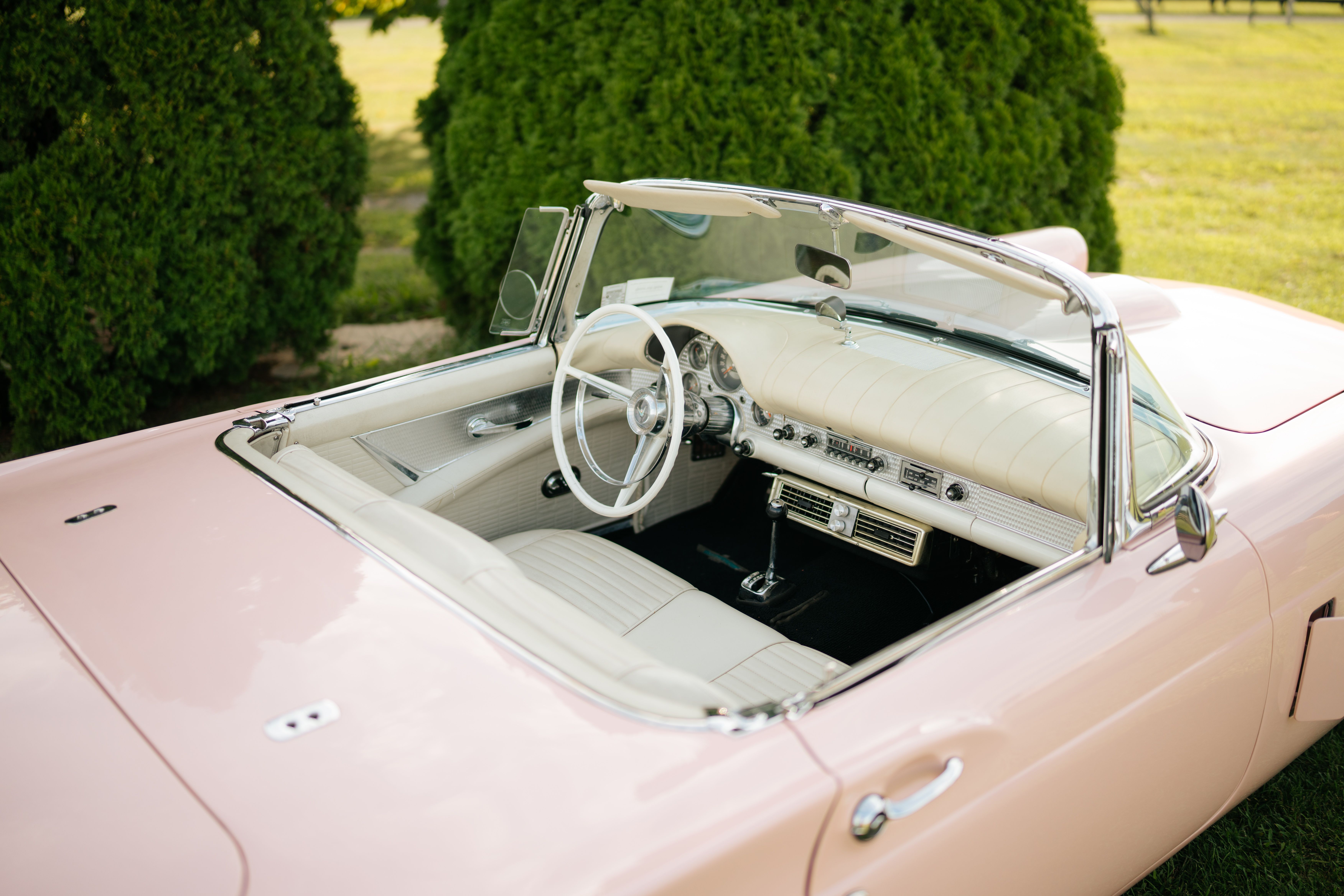 Vintage Pink Convertible Car Interior on Display · Free Stock Photo