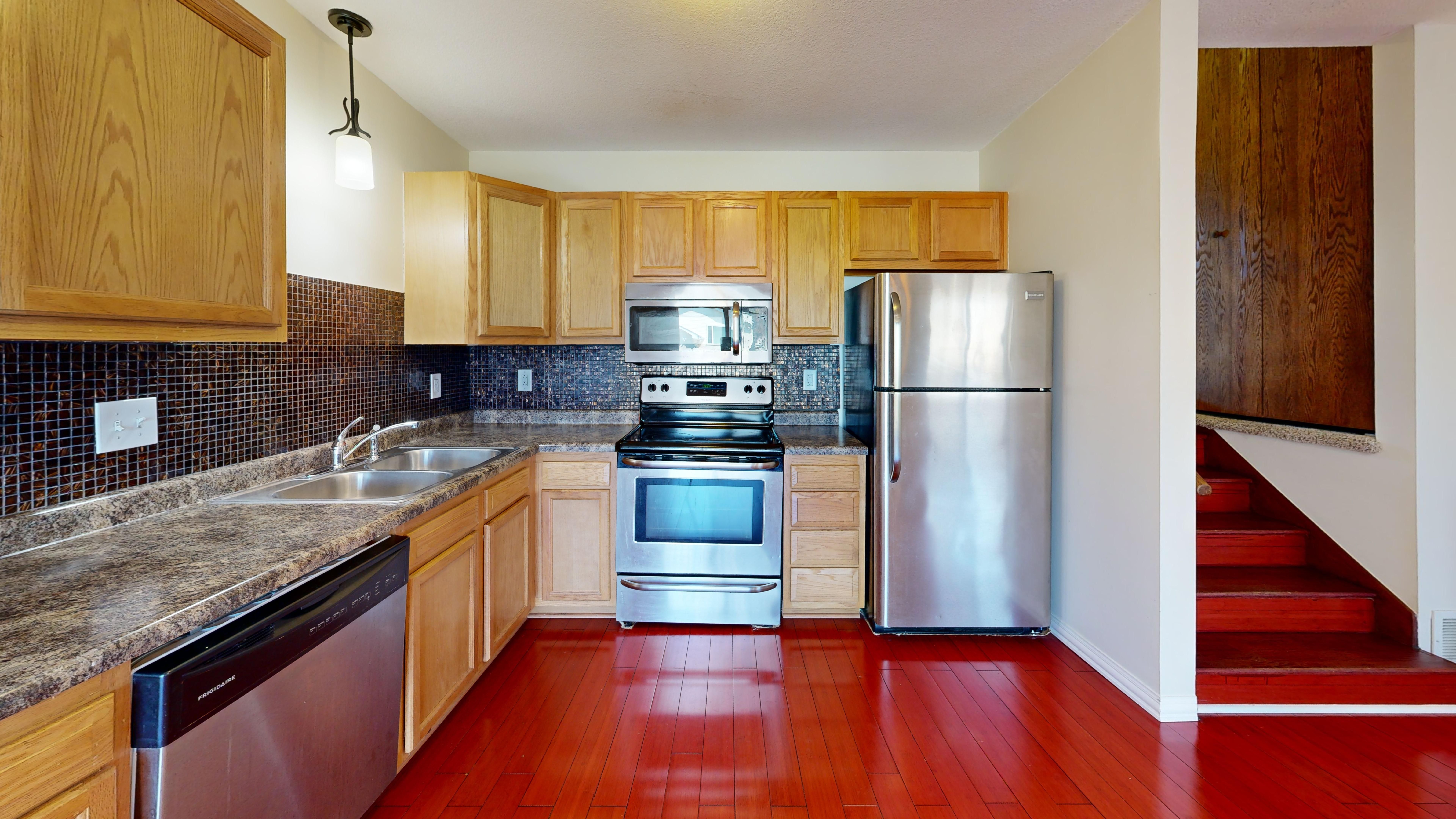 Walnut Park kitchen flooring in a compact bungalow layout