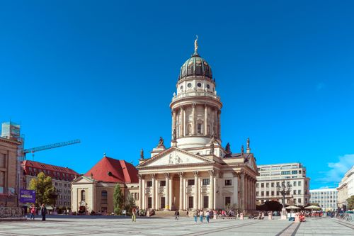 Free Stunning view of the French Cathedral on Gendarmenmarkt in Berlin under a clear blue sky. Stock Photo