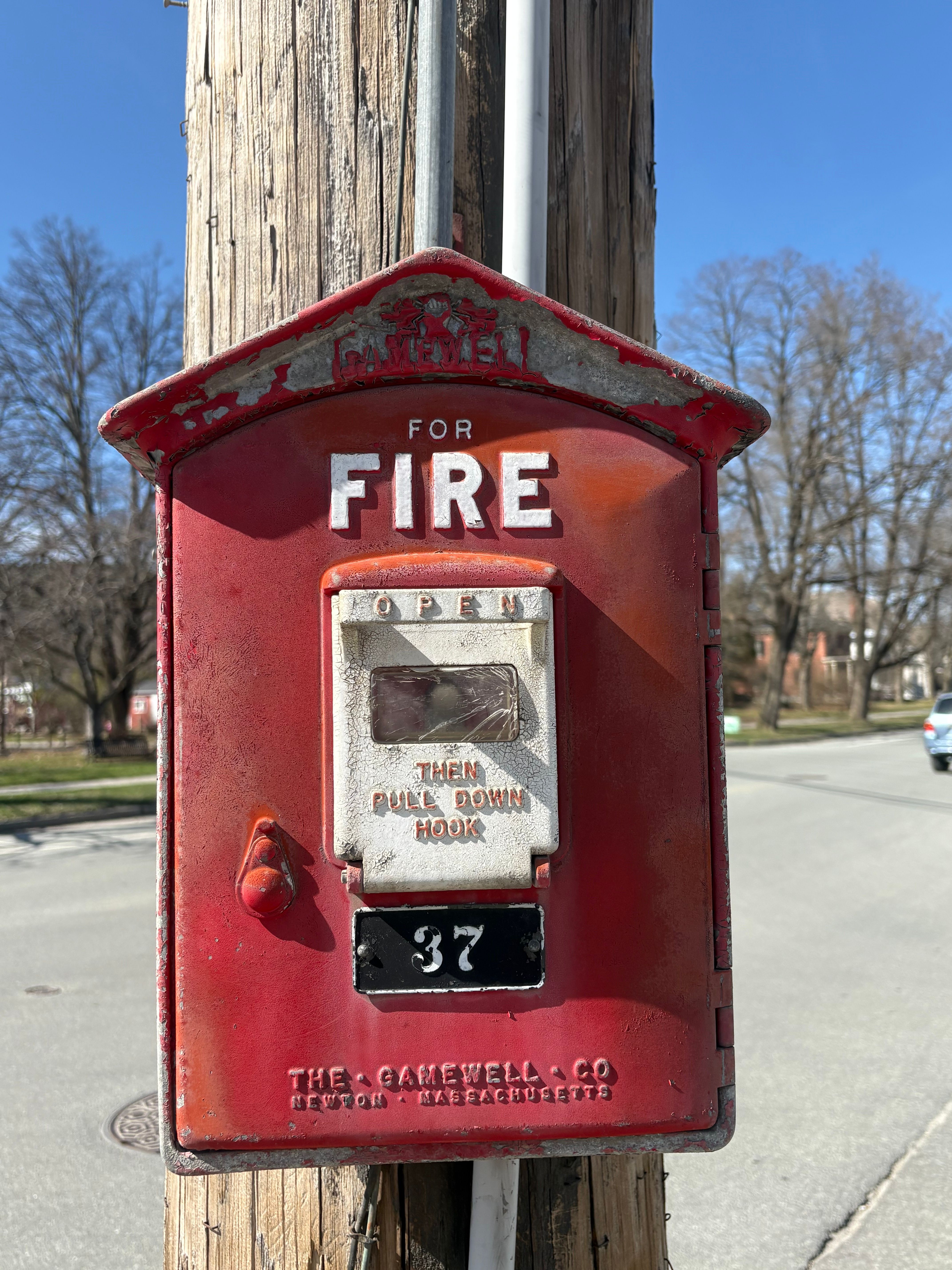 Vintage Fire Alarm Box on Utility Pole Outdoors · Free Stock Photo