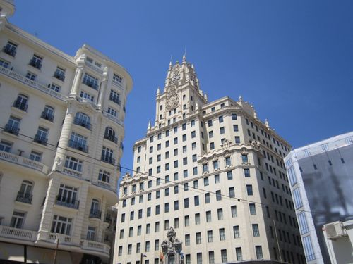 Free View of the Telefónica Building in Madrid showcasing its elegant architecture on a sunny day. Stock Photo