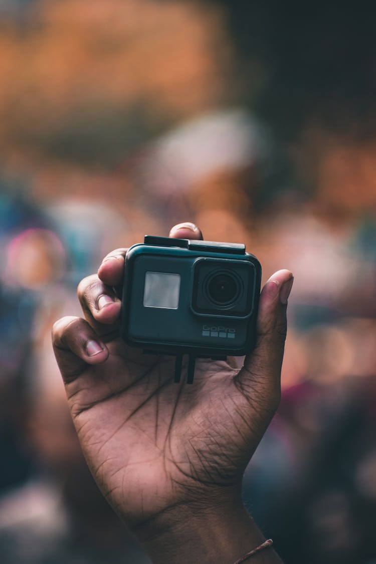 A Person Holding Gopro Camera