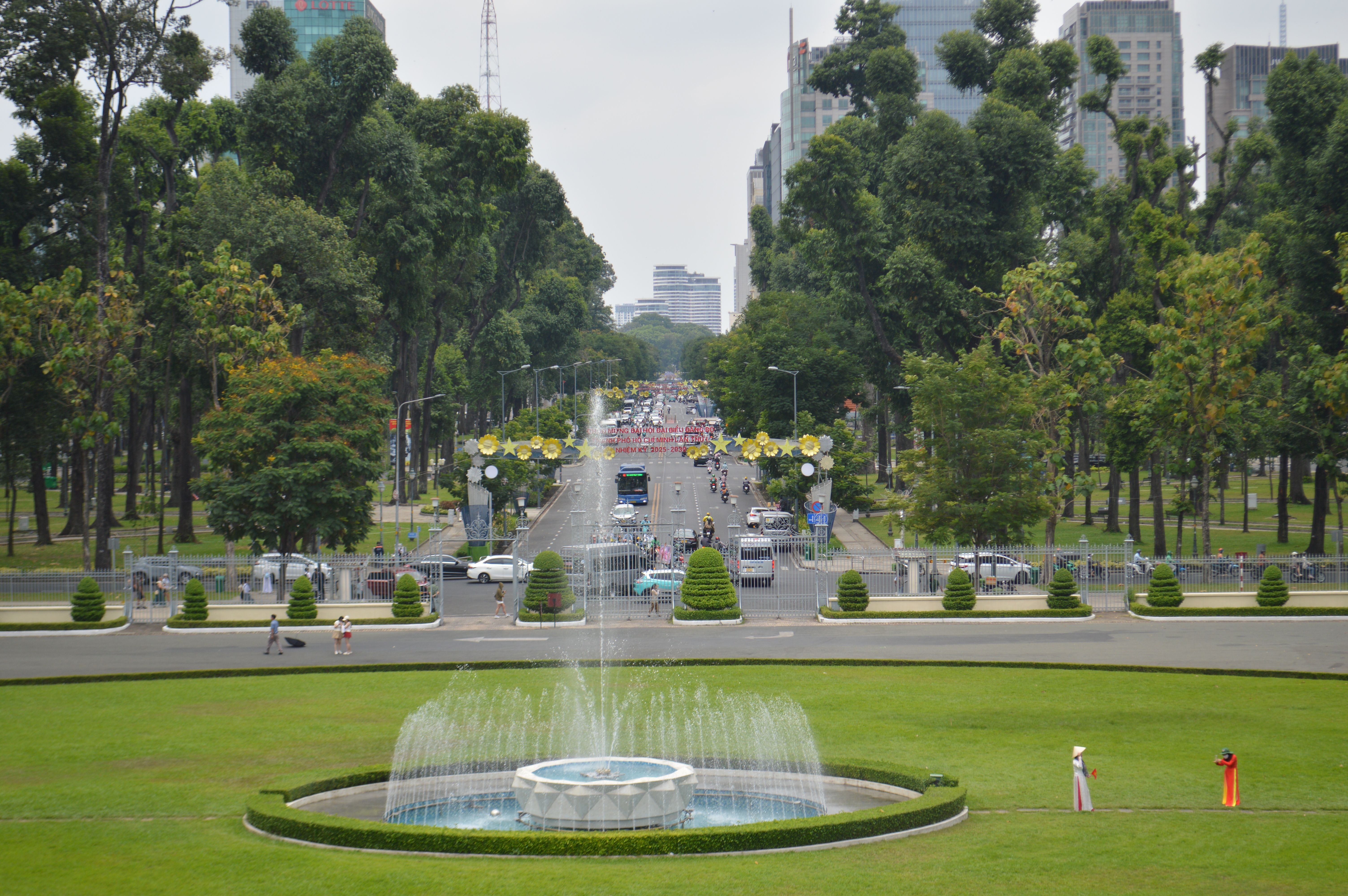 Wide tree-lined boulevard leading to Ananta Samakhom Throne Hall in Dusit