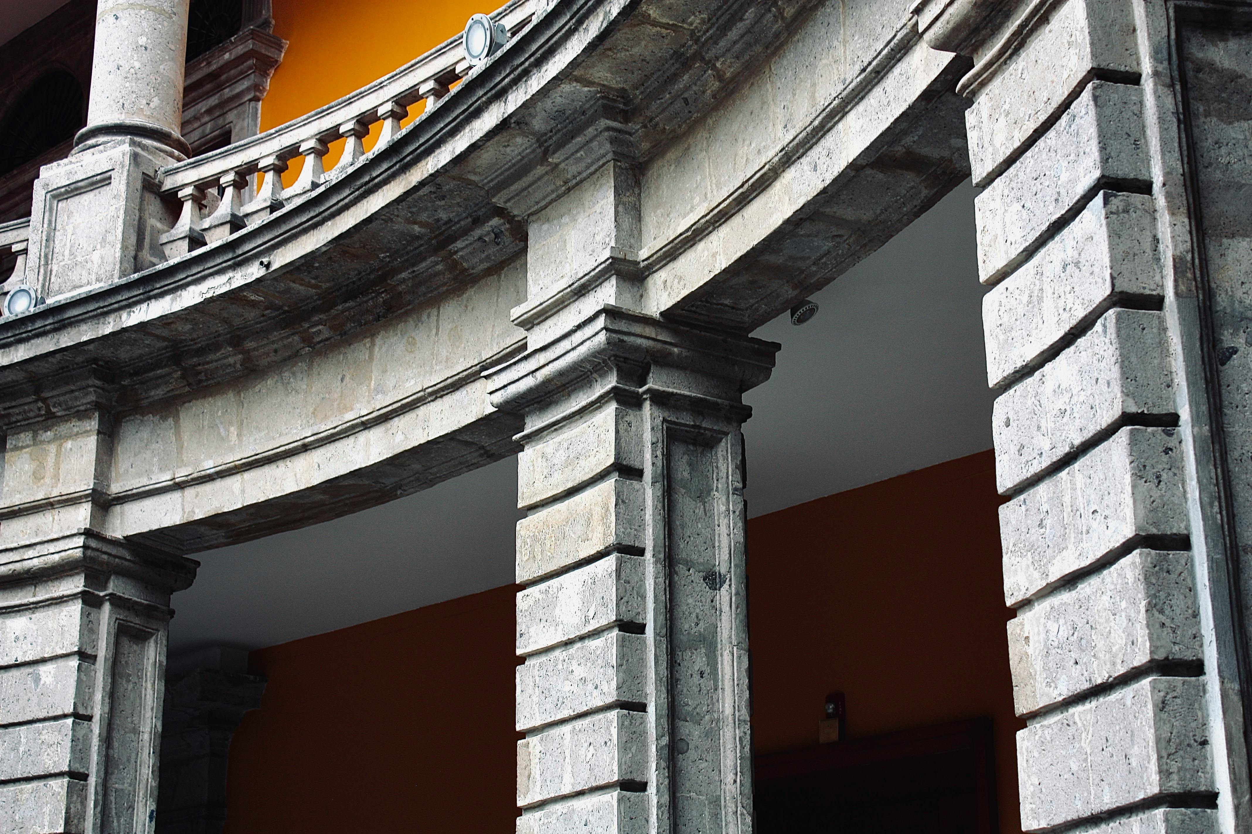 Capture of historic stone columns with intricate design in Ciudad de México.