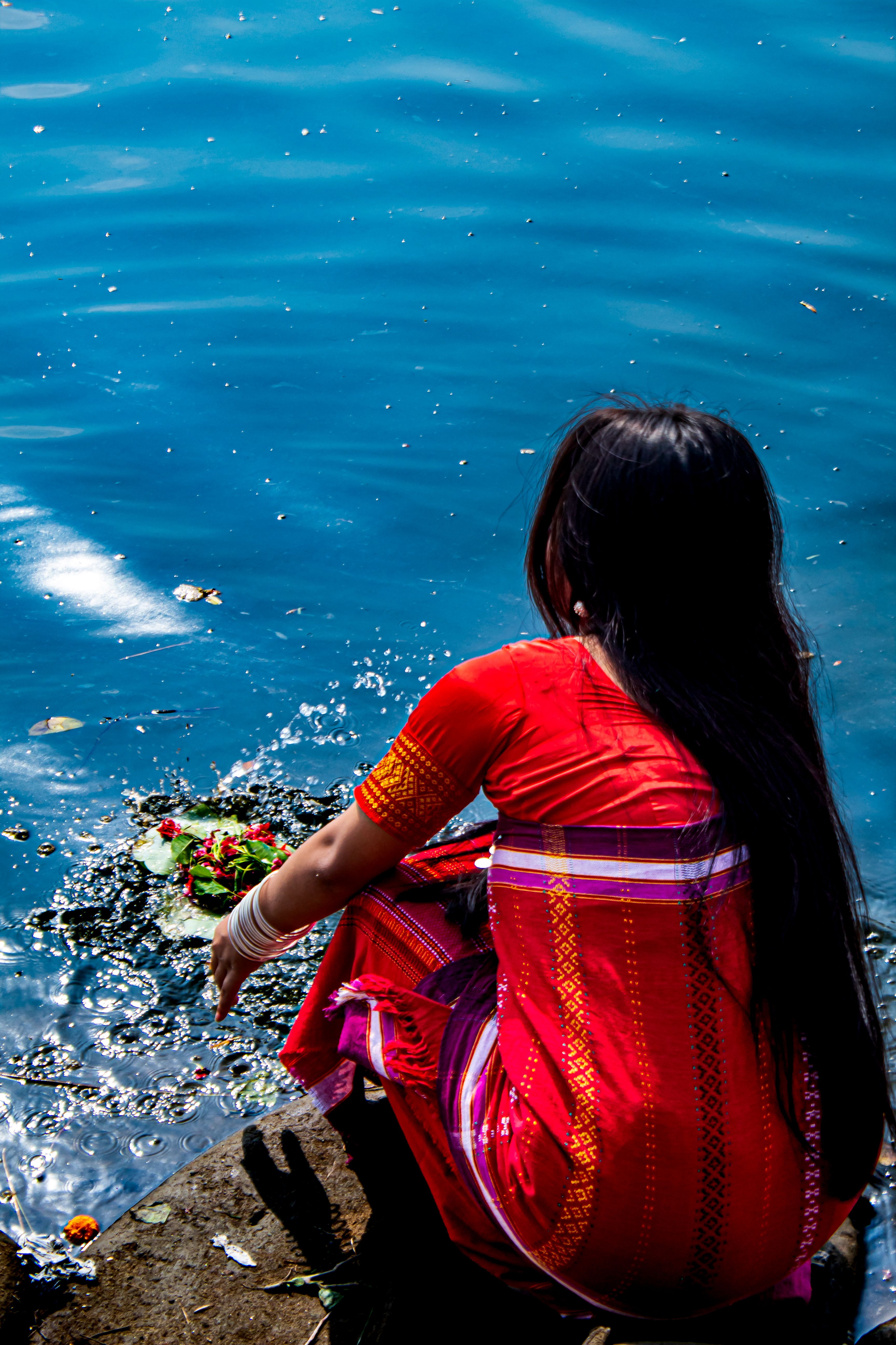 Woman in Traditional Dress by Water Offering · Free Stock Photo