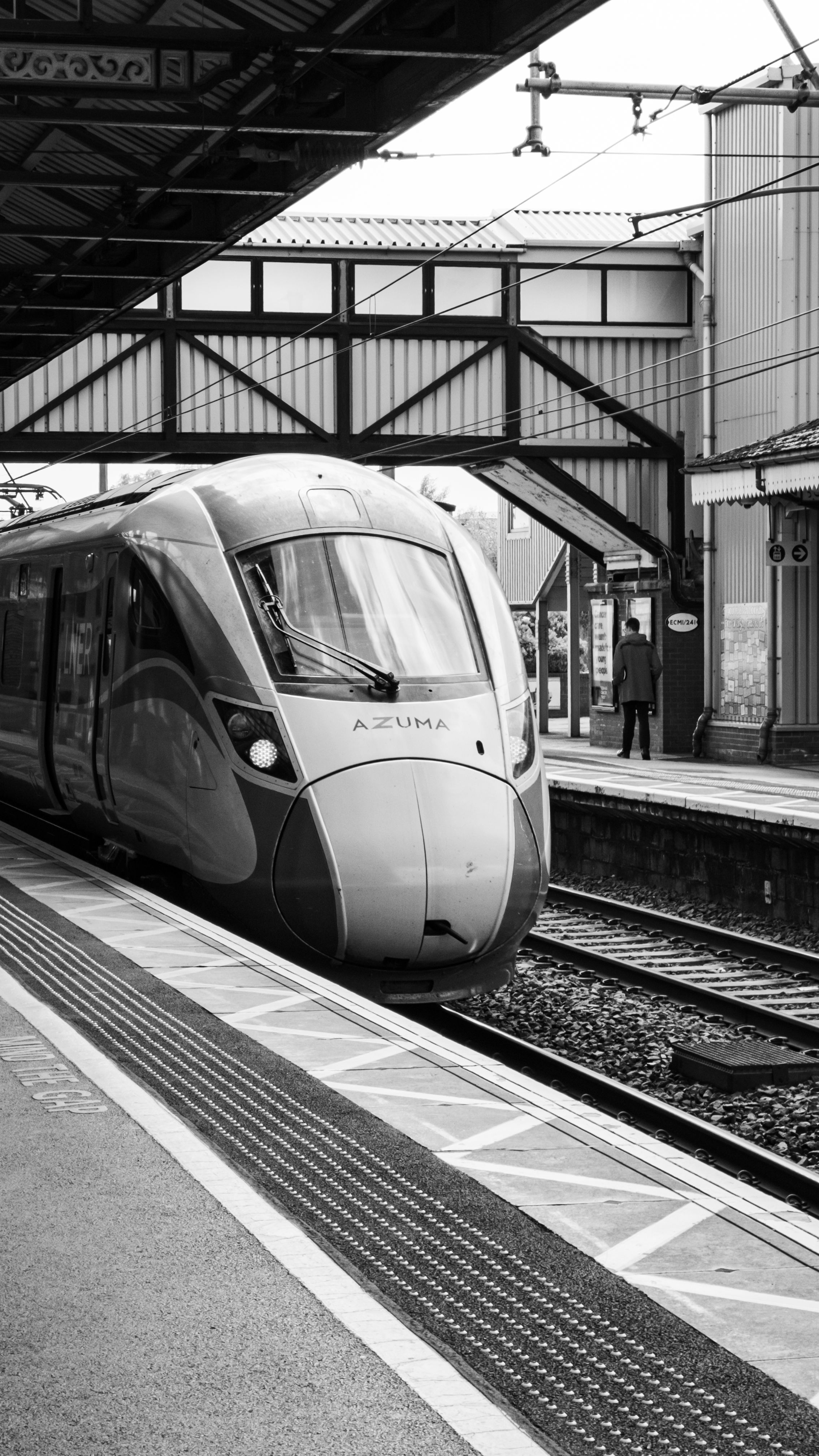 Black and white photo of Azuma train at Grantham Station, England.