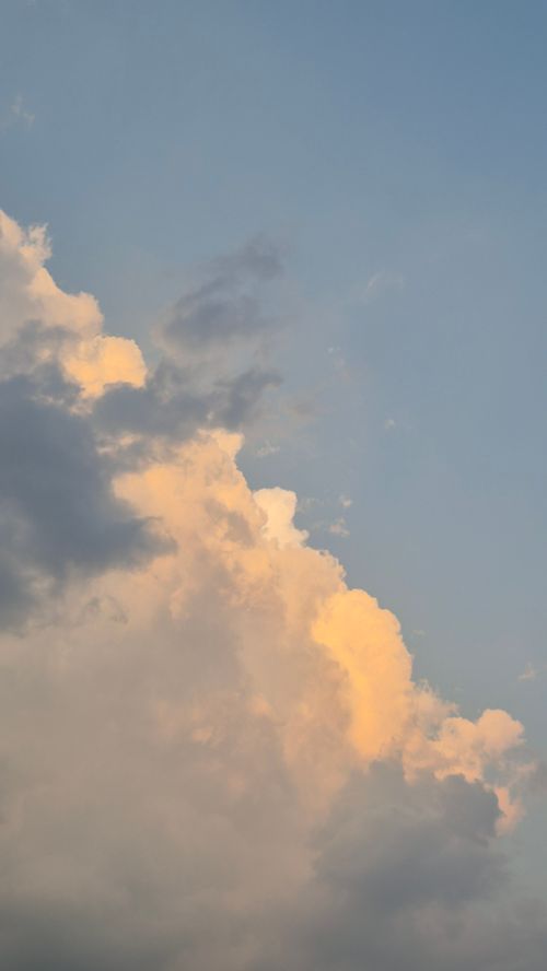 Free A peaceful cloud formation illuminated by sunset light in Gia Lai, Vietnam. Stock Photo