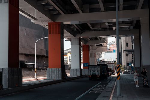 Urban/street Runder Urban Street Scene Under Elevated Railway in Taiwan · Free Stock Photo