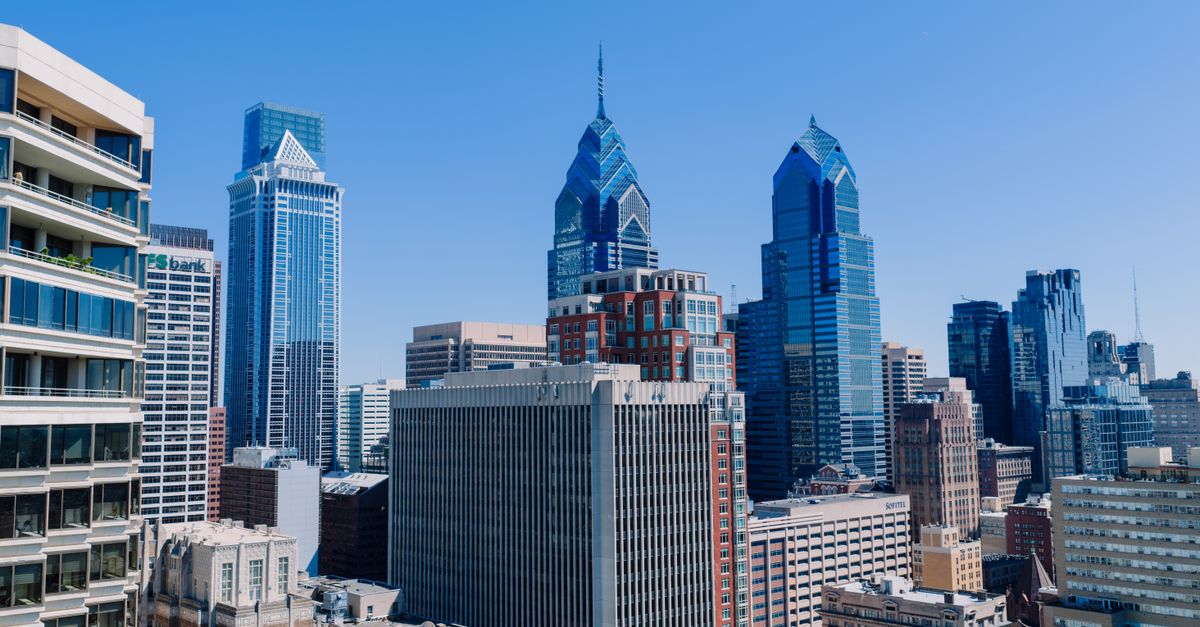 Aerial view of Philadelphia's cityscape showcasing the skyline's iconic skyscrapers on a clear day.