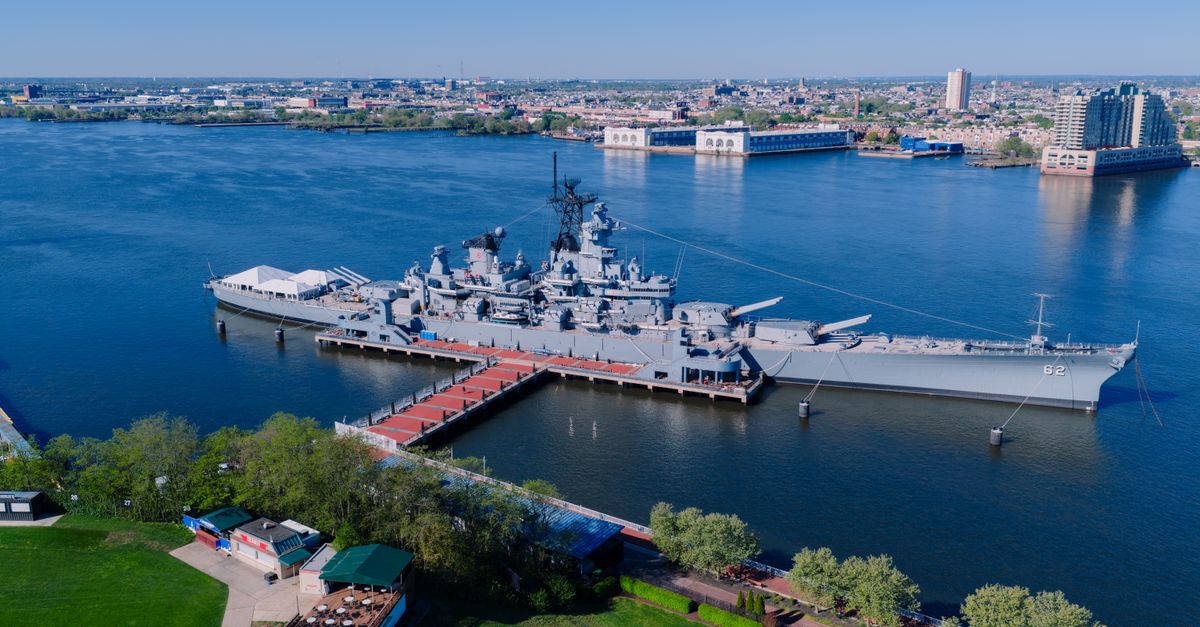 Stunning aerial shot of the USS New Jersey battleship docked in Philadelphia, Pennsylvania.