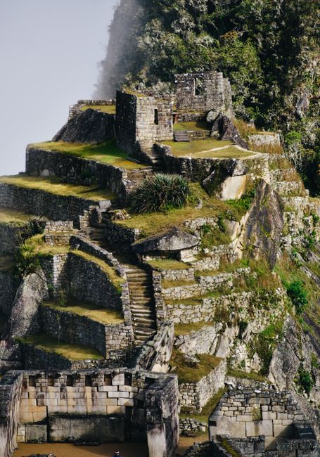 Breathtaking view of Machu Picchu's terraced stone structures and lush greenery.