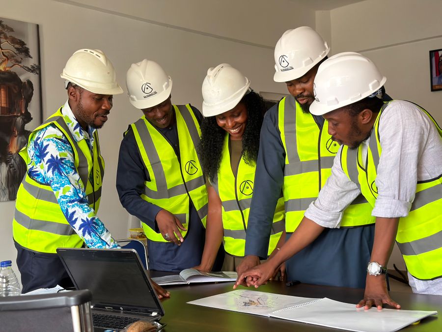 Team of engineers reviewing plans