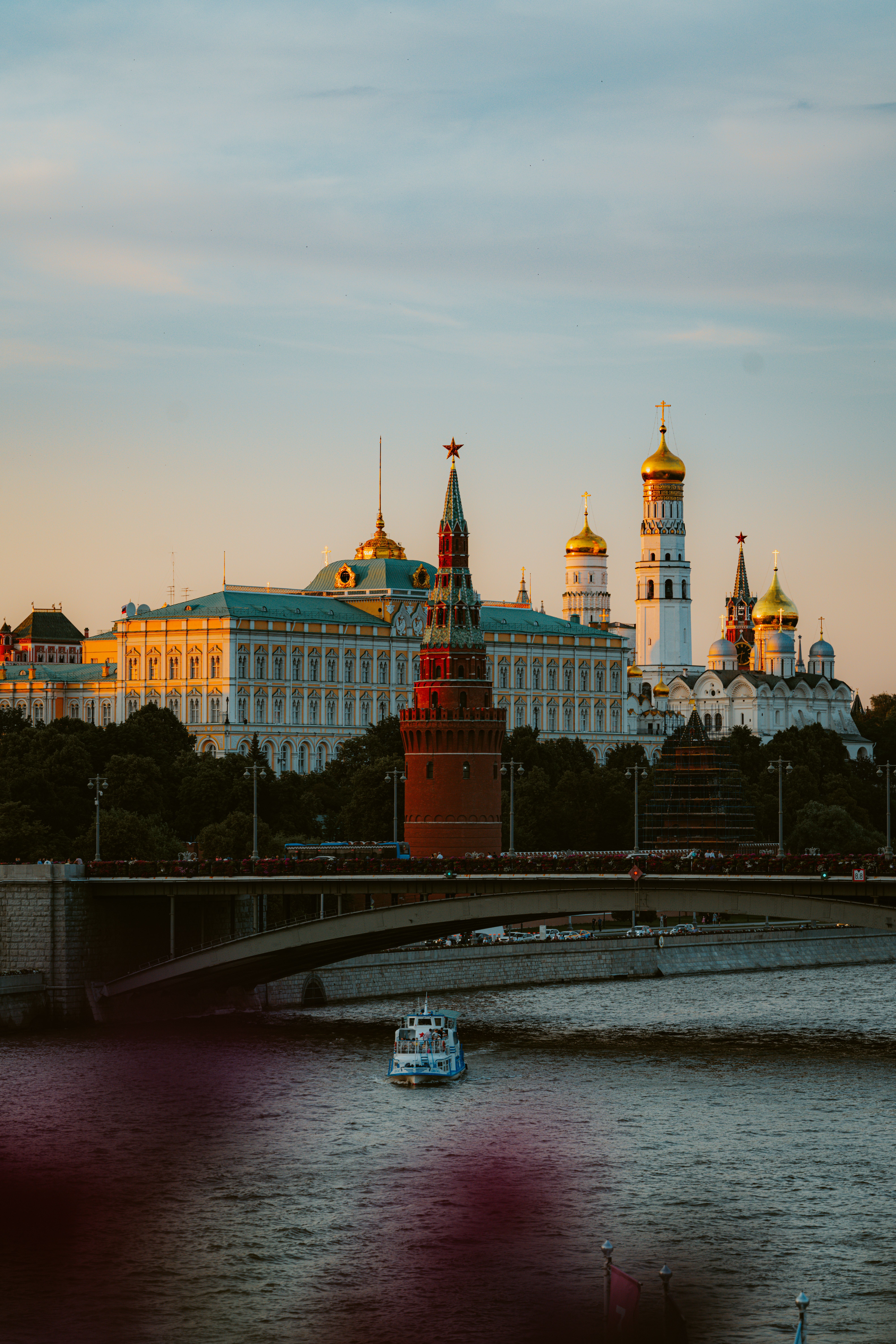 Capturing the iconic Moscow Kremlin during sunset, showcasing its stunning architecture and vibrant colors.