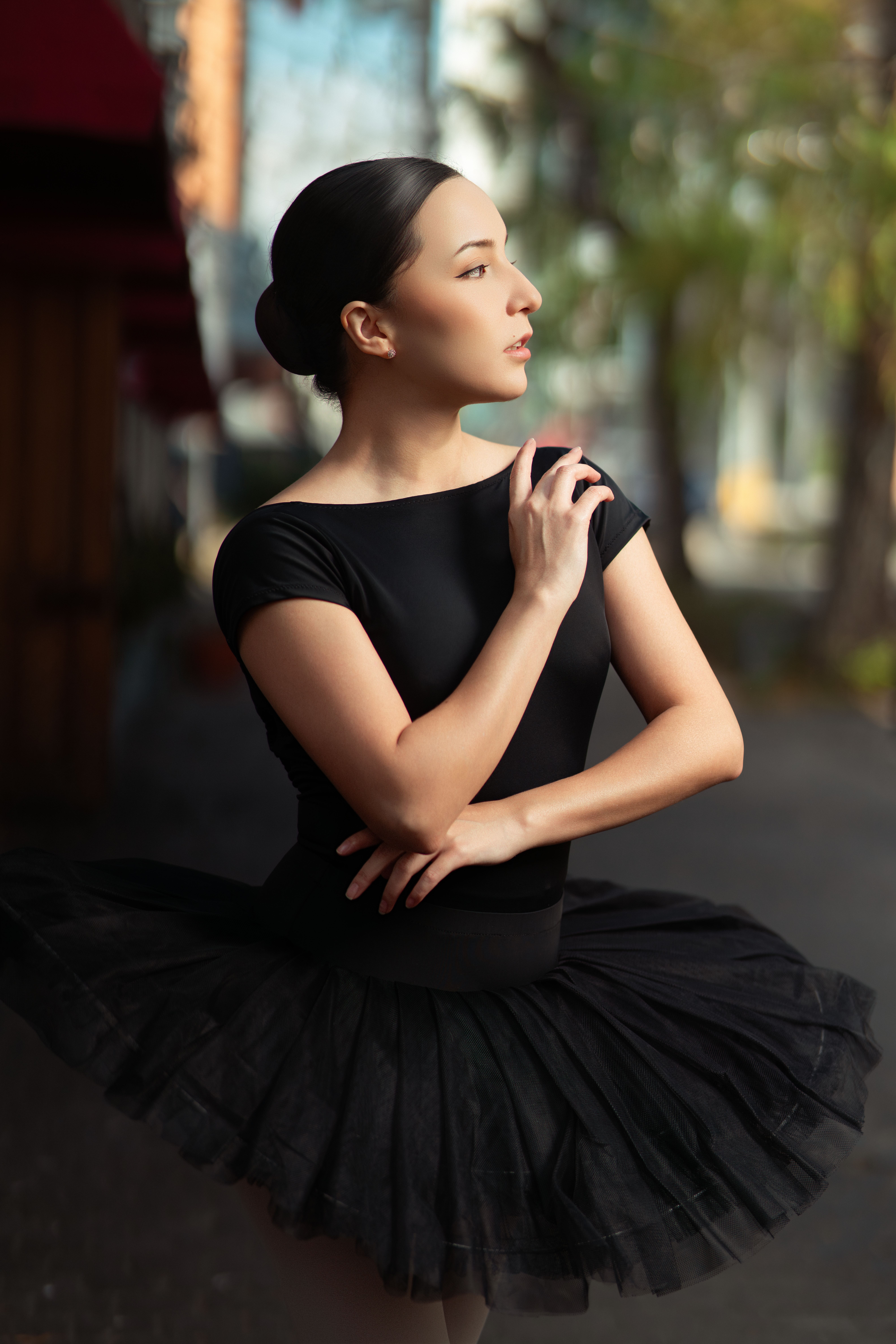 A Woman in Black Ballet Dress Sitting on the Stairs  Free Stock Photo