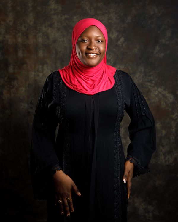 Portrait of a Smiling Woman in Hijab · Free Stock Photo