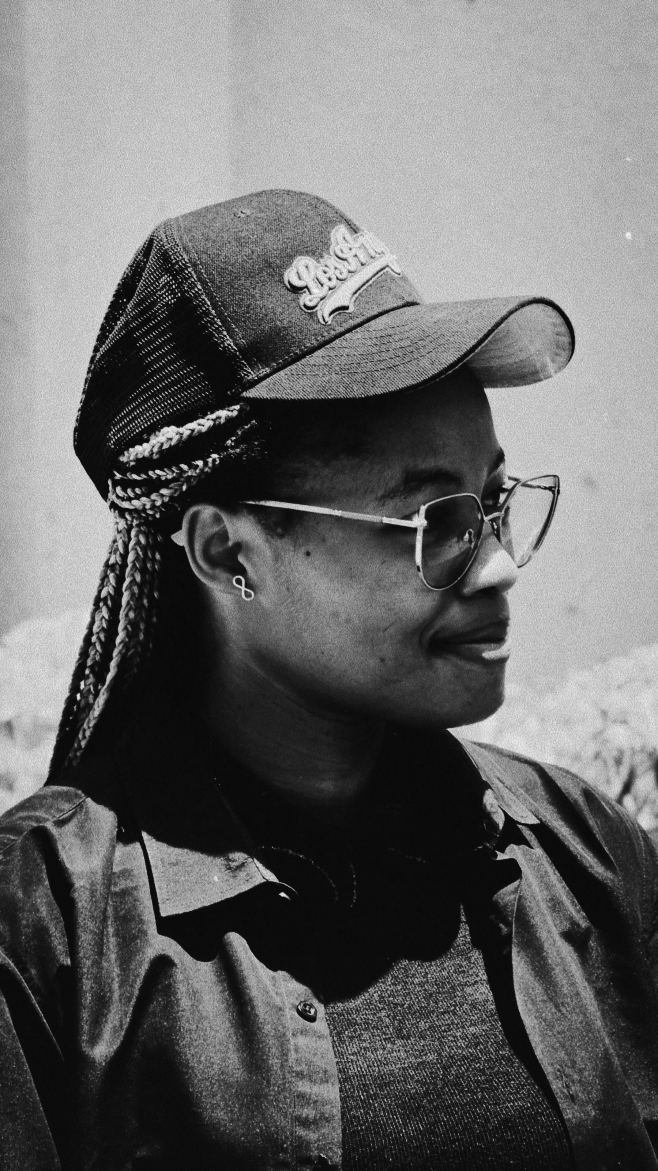Black and White Portrait of a Woman with Glasses · Free Stock Photo