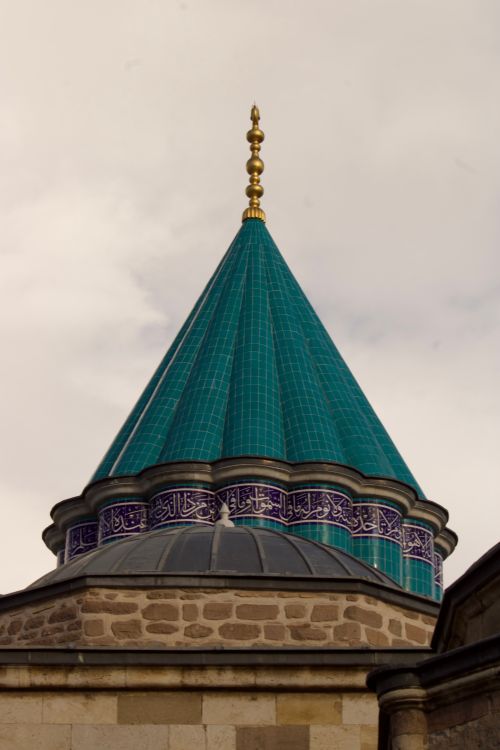 Free Close-up of the iconic turquoise dome of the Mevlana Museum in Konya, Turkey. Stock Photo