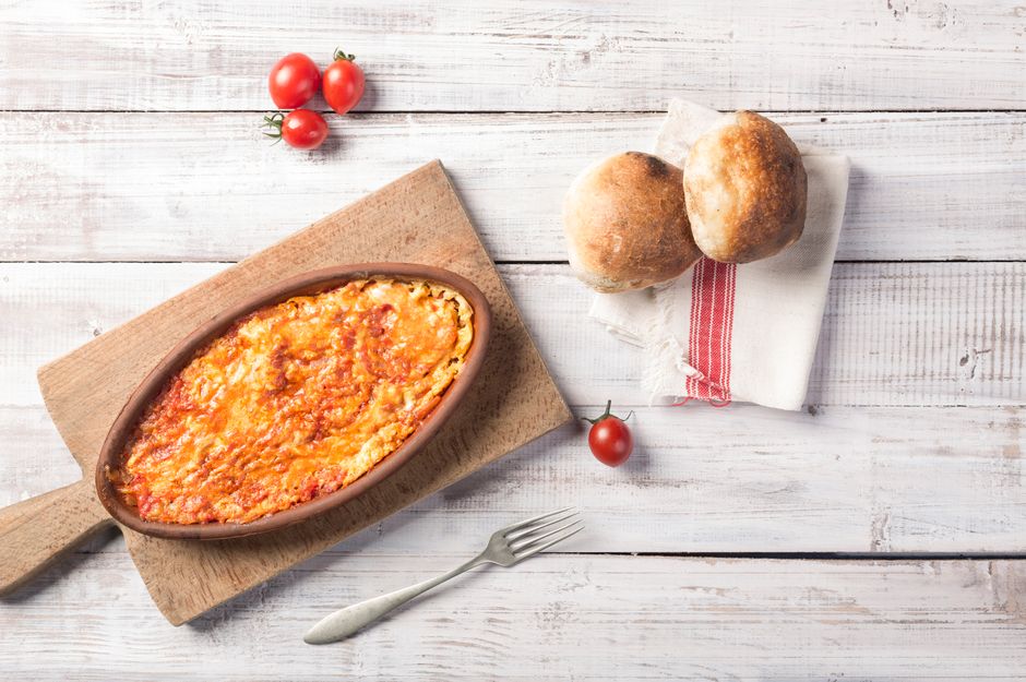 A delicious plate of Tavče Gravče, a traditional baked bean dish, served in a North Macedonian restaurant